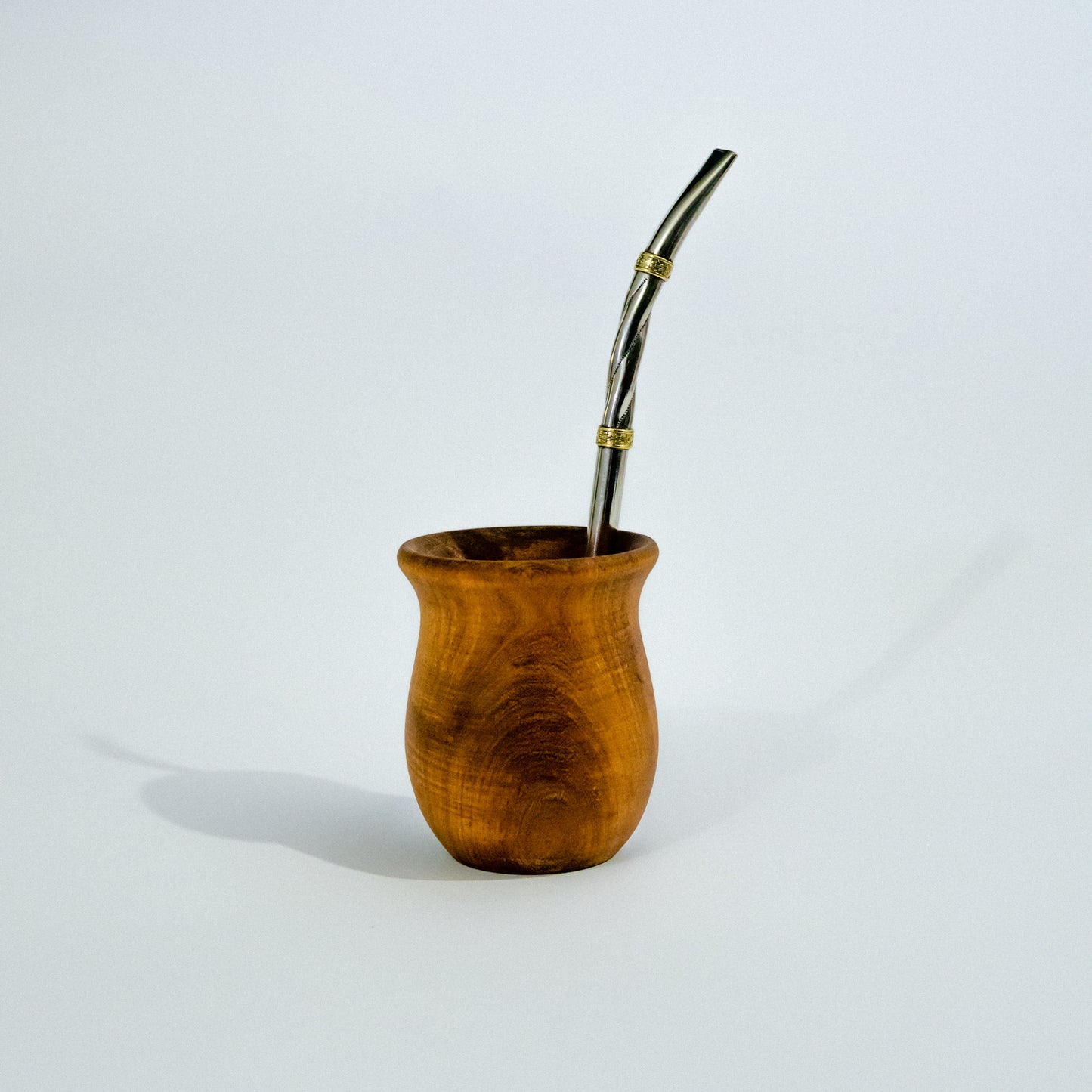 Bombillon de Alpaca torneada con Apliques en Bronce